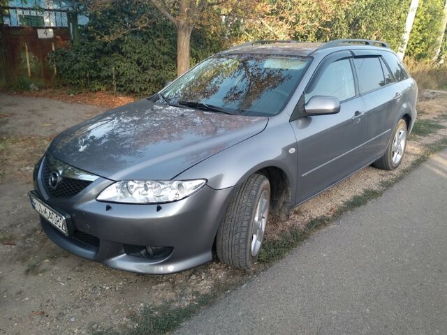 Серый Мазда 6, объемом двигателя 2 л и пробегом 245 тыс. км за 3500 $, фото 1 на Automoto.ua
