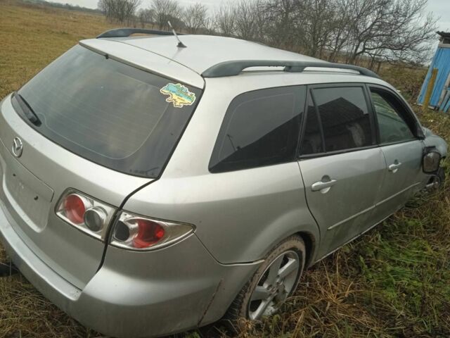 Серый Мазда 6, объемом двигателя 1.8 л и пробегом 200 тыс. км за 1111 $, фото 1 на Automoto.ua