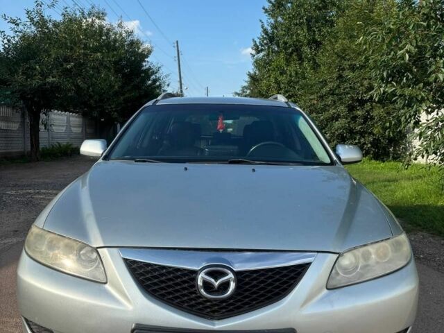 Серый Мазда 6, объемом двигателя 2 л и пробегом 344 тыс. км за 4000 $, фото 1 на Automoto.ua