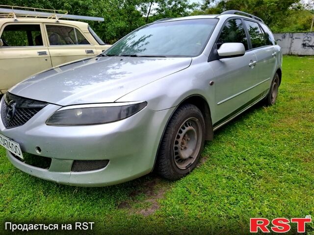 Серый Мазда 6, объемом двигателя 2 л и пробегом 378 тыс. км за 4200 $, фото 1 на Automoto.ua