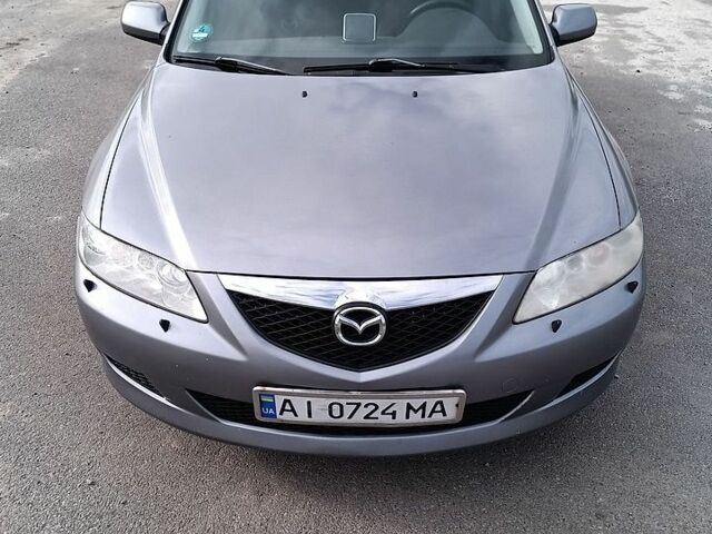Серый Мазда 6, объемом двигателя 2 л и пробегом 306 тыс. км за 3800 $, фото 1 на Automoto.ua