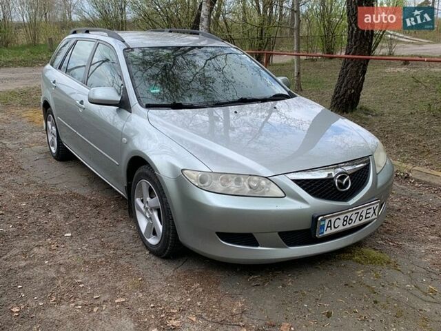 Серый Мазда 6, объемом двигателя 2 л и пробегом 266 тыс. км за 3700 $, фото 1 на Automoto.ua