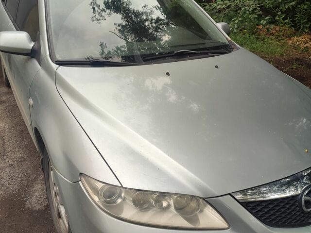 Сірий Мазда 6, об'ємом двигуна 2 л та пробігом 334 тис. км за 1852 $, фото 1 на Automoto.ua