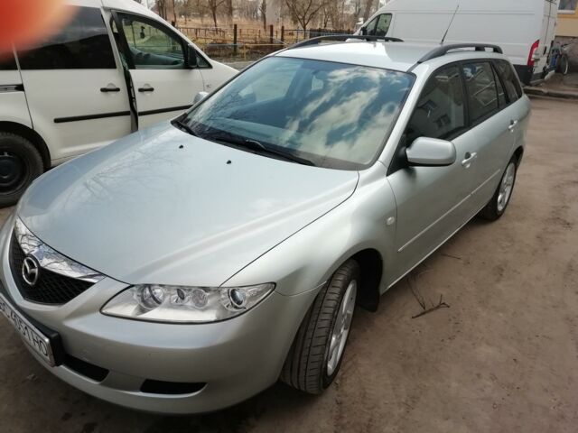 Серый Мазда 6, объемом двигателя 2 л и пробегом 217 тыс. км за 6100 $, фото 1 на Automoto.ua