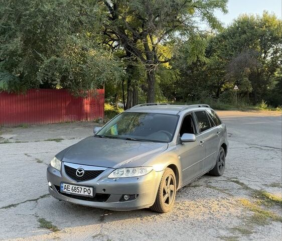 Серый Мазда 6, объемом двигателя 2 л и пробегом 235 тыс. км за 1749 $, фото 1 на Automoto.ua