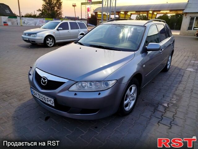 Серый Мазда 6, объемом двигателя 2 л и пробегом 250 тыс. км за 2850 $, фото 1 на Automoto.ua