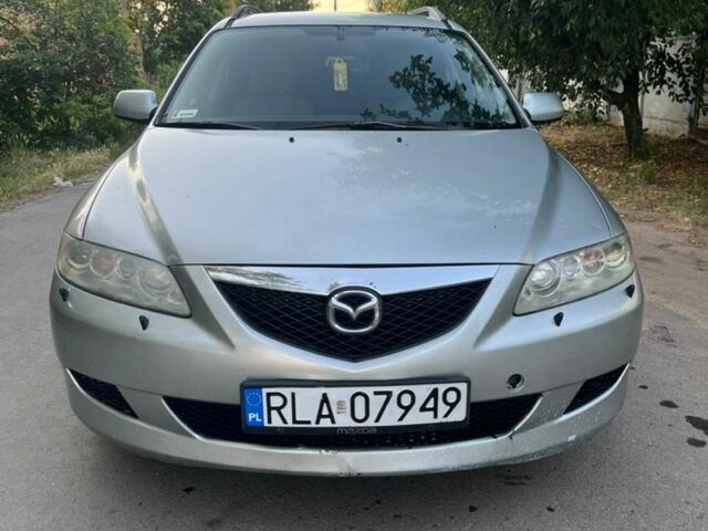 Серый Мазда 6, объемом двигателя 2 л и пробегом 300 тыс. км за 2000 $, фото 1 на Automoto.ua