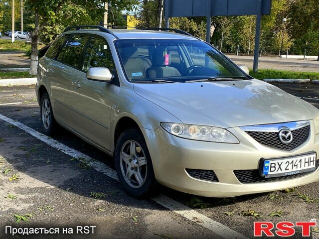 Серый Мазда 6, объемом двигателя 2 л и пробегом 290 тыс. км за 3500 $, фото 1 на Automoto.ua