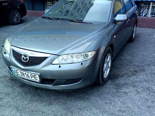 Серый Мазда 6, объемом двигателя 2 л и пробегом 324 тыс. км за 4000 $, фото 1 на Automoto.ua