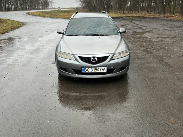 Серый Мазда 6, объемом двигателя 2 л и пробегом 294 тыс. км за 2000 $, фото 1 на Automoto.ua