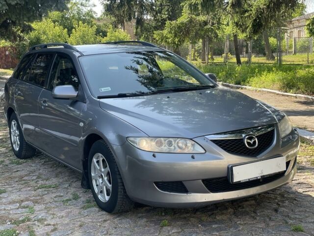Серый Мазда 6, объемом двигателя 2 л и пробегом 280 тыс. км за 2350 $, фото 1 на Automoto.ua
