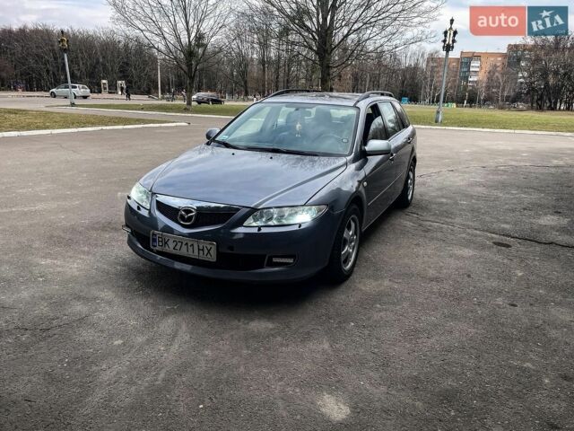 Серый Мазда 6, объемом двигателя 2 л и пробегом 304 тыс. км за 3700 $, фото 1 на Automoto.ua