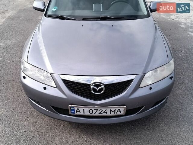 Серый Мазда 6, объемом двигателя 2 л и пробегом 306 тыс. км за 4300 $, фото 1 на Automoto.ua