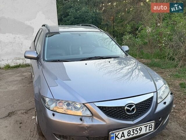 Серый Мазда 6, объемом двигателя 2 л и пробегом 248 тыс. км за 3700 $, фото 1 на Automoto.ua