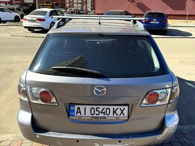 Серый Мазда 6, объемом двигателя 2 л и пробегом 415 тыс. км за 2200 $, фото 1 на Automoto.ua