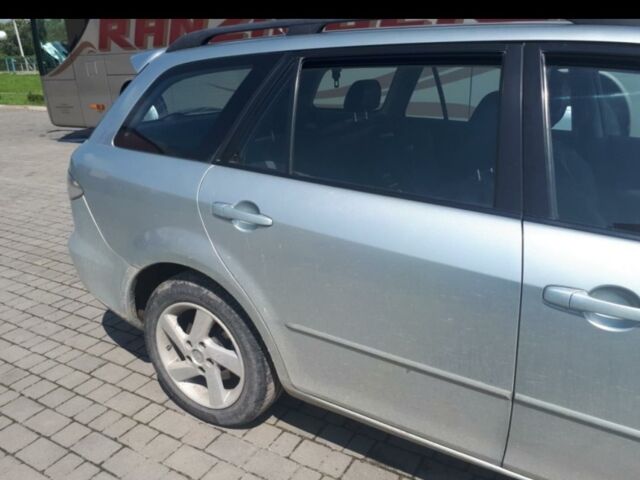 Сірий Мазда 6, об'ємом двигуна 2 л та пробігом 234 тис. км за 2100 $, фото 1 на Automoto.ua