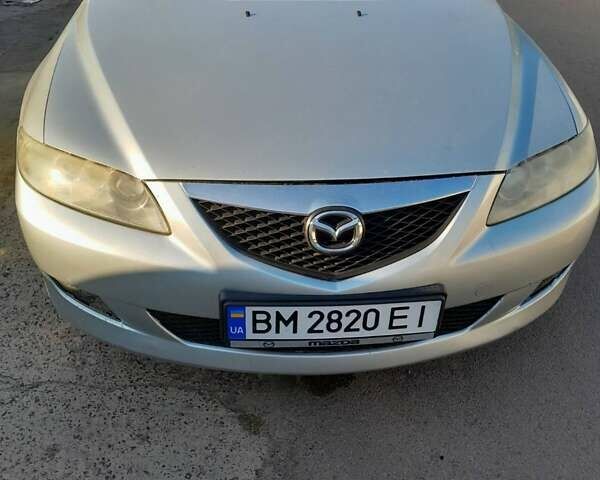 Серый Мазда 6, объемом двигателя 2 л и пробегом 344 тыс. км за 4800 $, фото 1 на Automoto.ua