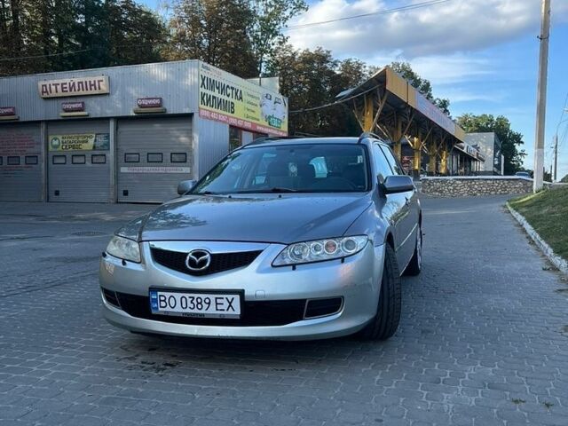 Серый Мазда 6, объемом двигателя 2 л и пробегом 439 тыс. км за 3399 $, фото 1 на Automoto.ua