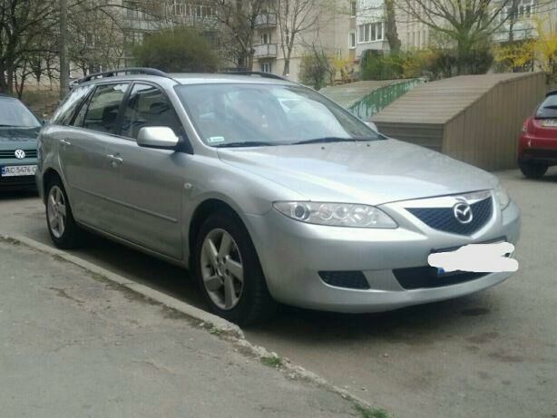 Серый Мазда 6, объемом двигателя 2 л и пробегом 265 тыс. км за 5200 $, фото 1 на Automoto.ua