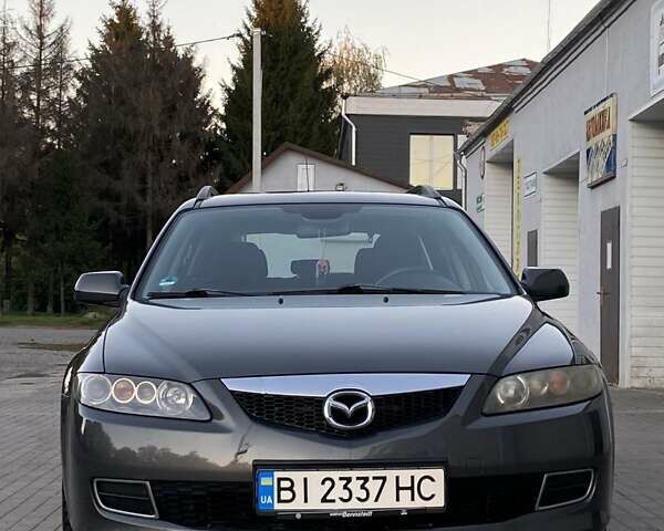 Серый Мазда 6, объемом двигателя 1.8 л и пробегом 205 тыс. км за 5200 $, фото 1 на Automoto.ua
