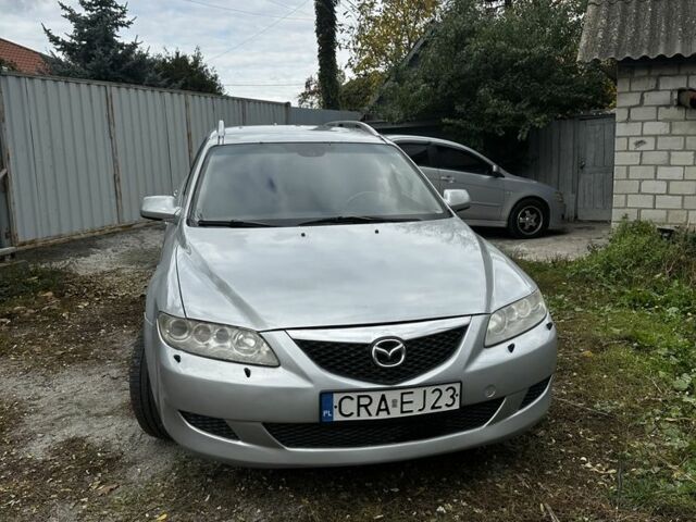 Серый Мазда 6, объемом двигателя 2 л и пробегом 290 тыс. км за 1200 $, фото 1 на Automoto.ua