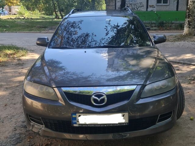 Серый Мазда 6, объемом двигателя 2 л и пробегом 300 тыс. км за 5300 $, фото 1 на Automoto.ua