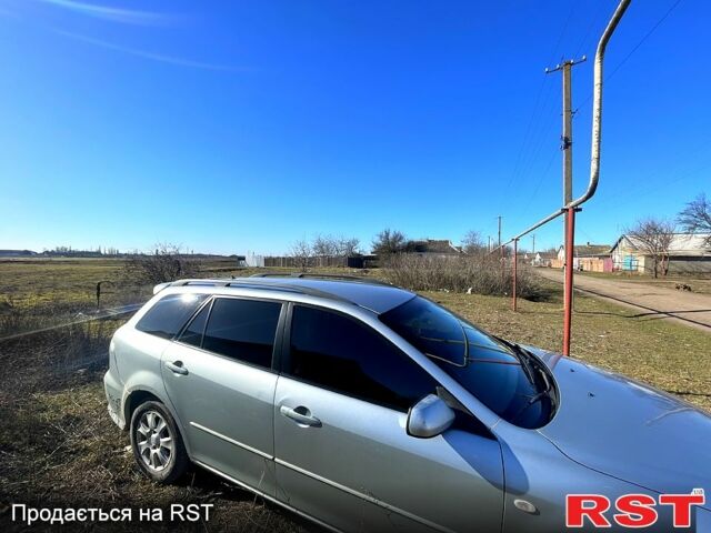 Серый Мазда 6, объемом двигателя 2 л и пробегом 300 тыс. км за 2600 $, фото 1 на Automoto.ua