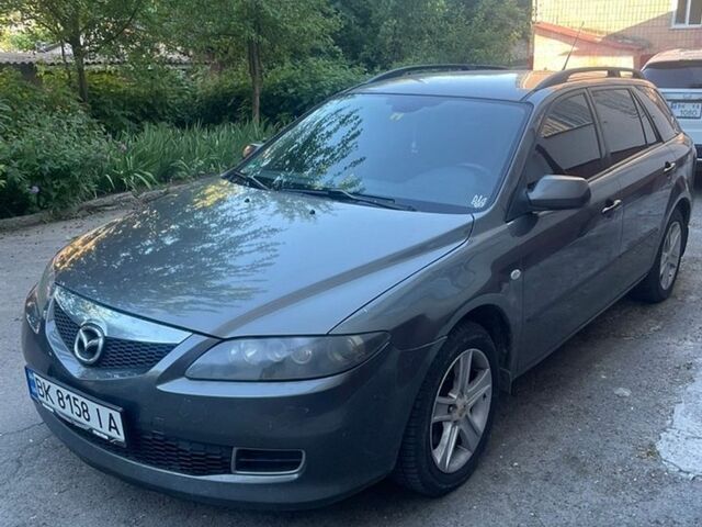 Серый Мазда 6, объемом двигателя 2 л и пробегом 357 тыс. км за 2800 $, фото 1 на Automoto.ua
