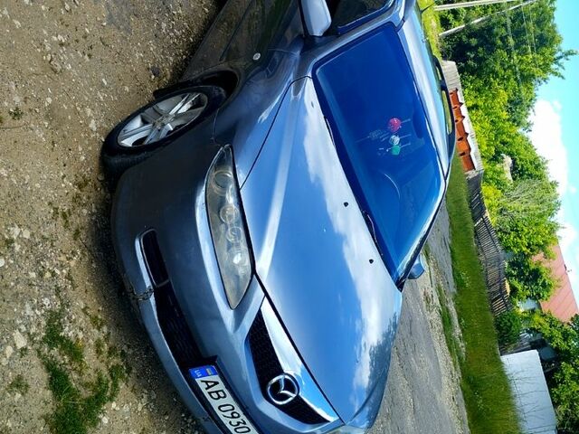 Серый Мазда 6, объемом двигателя 2 л и пробегом 165 тыс. км за 2550 $, фото 1 на Automoto.ua