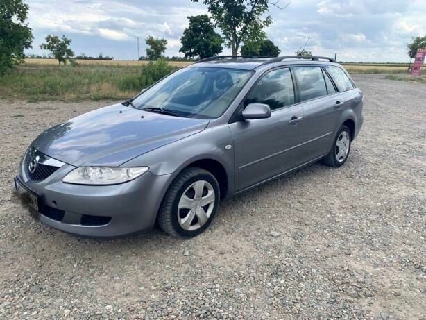 Серый Мазда 6, объемом двигателя 2 л и пробегом 189 тыс. км за 5800 $, фото 1 на Automoto.ua