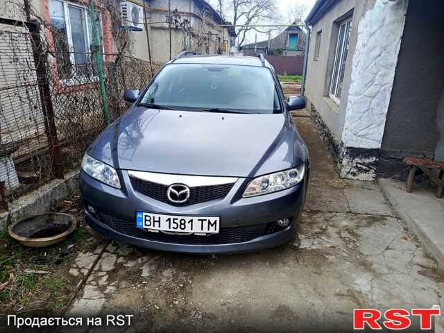 Серый Мазда 6, объемом двигателя 2 л и пробегом 338 тыс. км за 3600 $, фото 1 на Automoto.ua