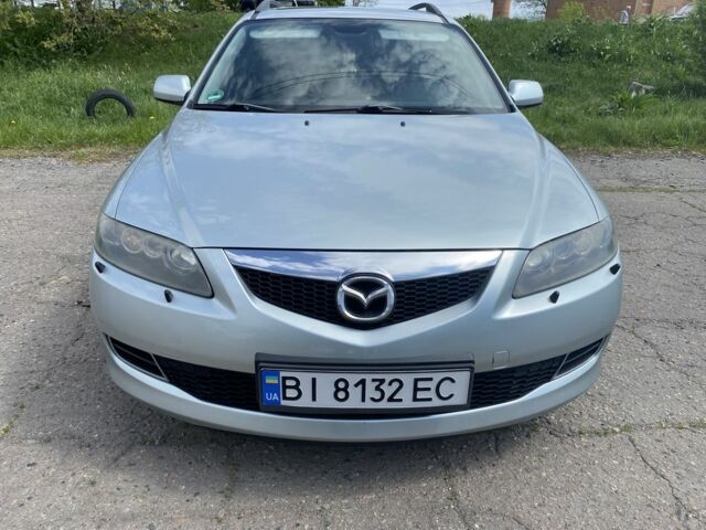 Серый Мазда 6, объемом двигателя 2.3 л и пробегом 255 тыс. км за 3333 $, фото 1 на Automoto.ua