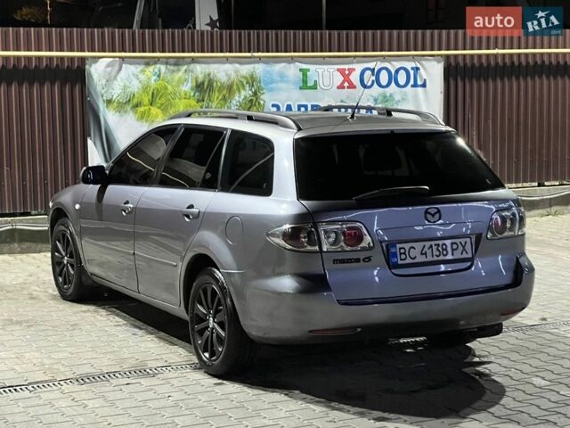 Сірий Мазда 6, об'ємом двигуна 2 л та пробігом 293 тис. км за 3900 $, фото 1 на Automoto.ua