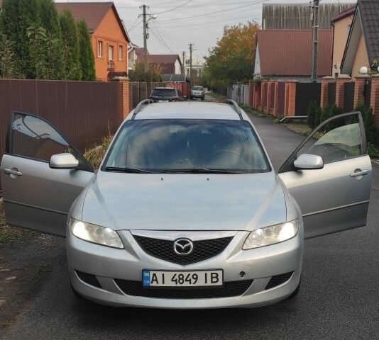Серый Мазда 6, объемом двигателя 2 л и пробегом 483 тыс. км за 3400 $, фото 1 на Automoto.ua