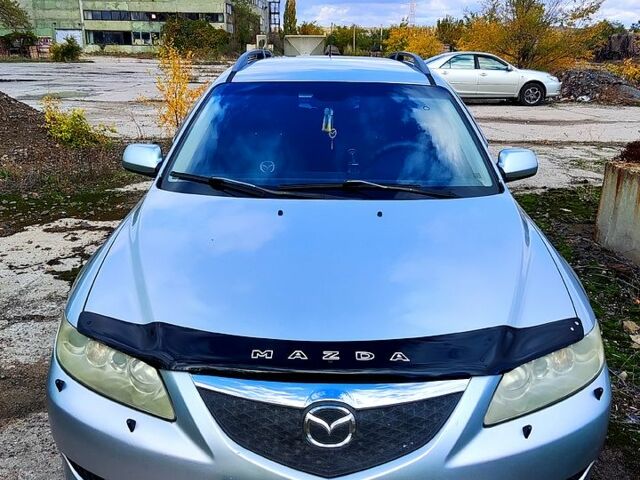 Серый Мазда 6, объемом двигателя 2 л и пробегом 364 тыс. км за 5000 $, фото 1 на Automoto.ua