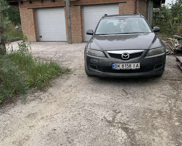 Серый Мазда 6, объемом двигателя 2 л и пробегом 302 тыс. км за 3400 $, фото 1 на Automoto.ua