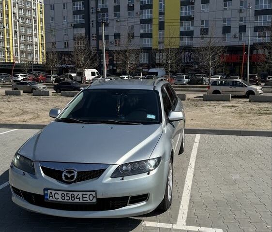 Серый Мазда 6, объемом двигателя 2 л и пробегом 253 тыс. км за 5200 $, фото 1 на Automoto.ua
