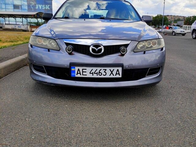 Серый Мазда 6, объемом двигателя 2 л и пробегом 307 тыс. км за 4500 $, фото 1 на Automoto.ua