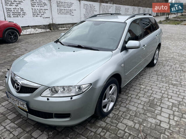Серый Мазда 6, объемом двигателя 2 л и пробегом 214 тыс. км за 4000 $, фото 1 на Automoto.ua