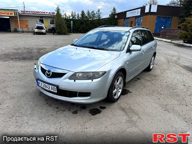 Серый Мазда 6, объемом двигателя 2 л и пробегом 270 тыс. км за 3300 $, фото 1 на Automoto.ua
