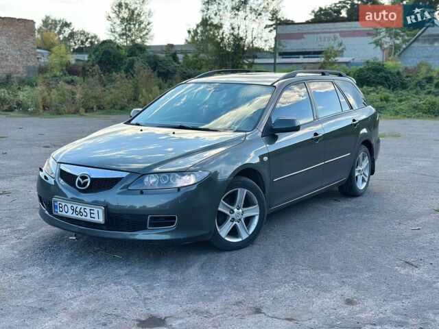 Серый Мазда 6, объемом двигателя 2 л и пробегом 314 тыс. км за 4000 $, фото 1 на Automoto.ua