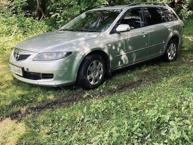 Серый Мазда 6, объемом двигателя 2 л и пробегом 231 тыс. км за 3900 $, фото 1 на Automoto.ua