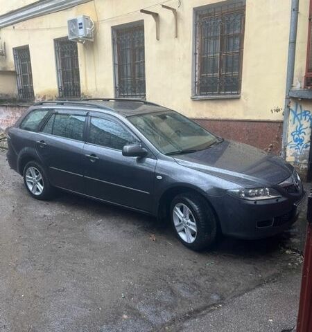 Серый Мазда 6, объемом двигателя 2 л и пробегом 265 тыс. км за 5600 $, фото 1 на Automoto.ua