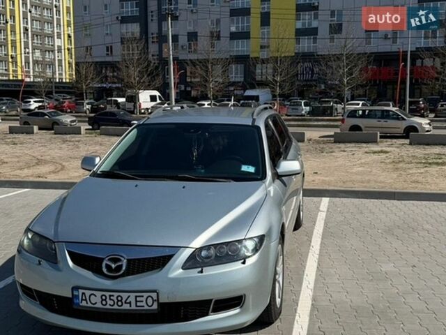 Серый Мазда 6, объемом двигателя 2 л и пробегом 253 тыс. км за 5200 $, фото 1 на Automoto.ua
