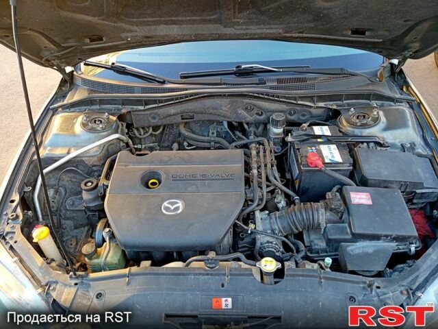 Серый Мазда 6, объемом двигателя 1.8 л и пробегом 228 тыс. км за 4900 $, фото 1 на Automoto.ua