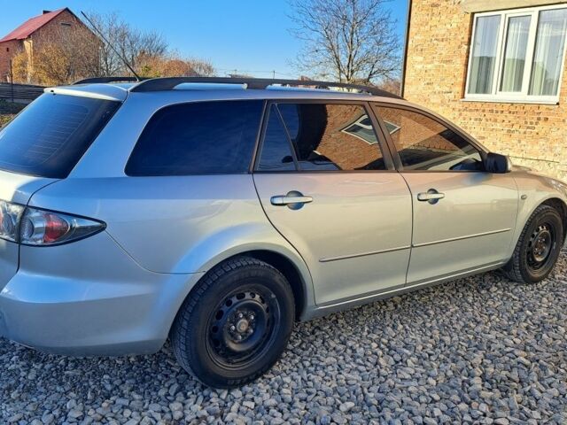 Сірий Мазда 6, об'ємом двигуна 2 л та пробігом 295 тис. км за 3999 $, фото 1 на Automoto.ua