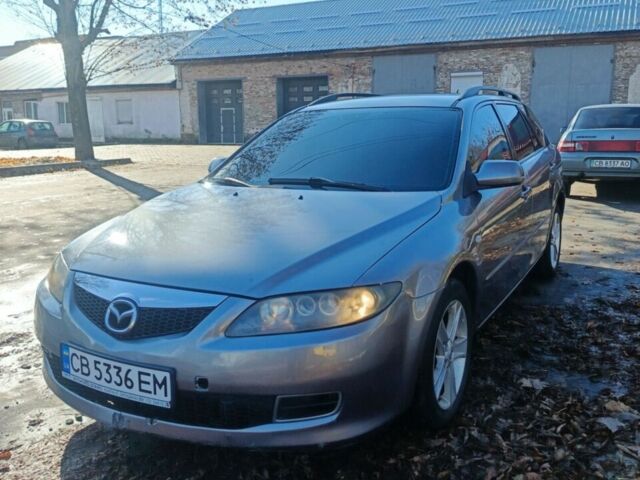 Серый Мазда 6, объемом двигателя 2 л и пробегом 300 тыс. км за 4200 $, фото 1 на Automoto.ua
