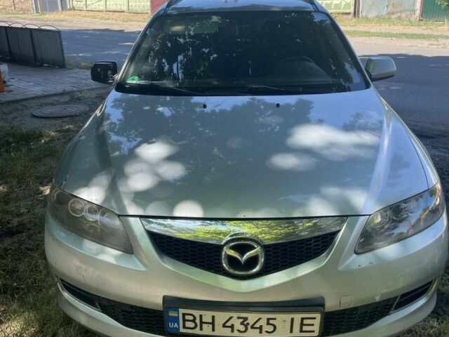Серый Мазда 6, объемом двигателя 2 л и пробегом 245 тыс. км за 2700 $, фото 1 на Automoto.ua
