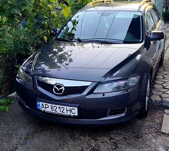Серый Мазда 6, объемом двигателя 2 л и пробегом 250 тыс. км за 5500 $, фото 1 на Automoto.ua