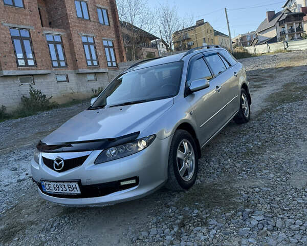 Серый Мазда 6, объемом двигателя 2 л и пробегом 254 тыс. км за 2999 $, фото 1 на Automoto.ua